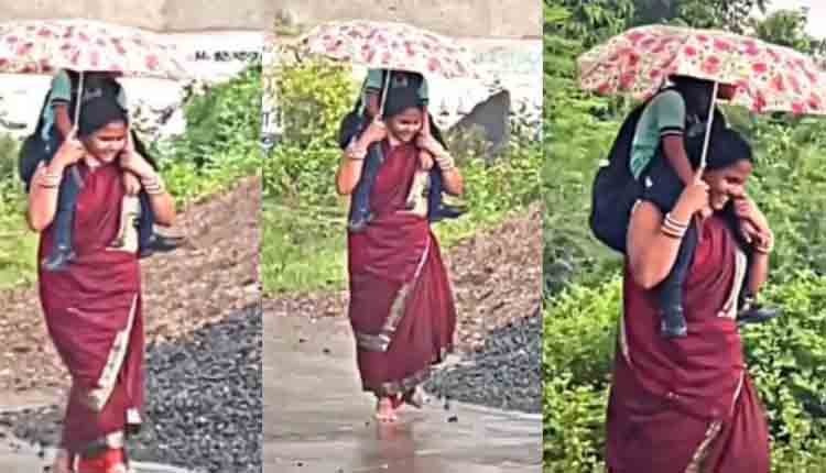 Mother Carries Daughter On Shoulders 1