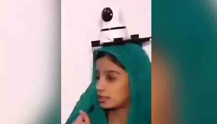 CCTV camera on women head 0