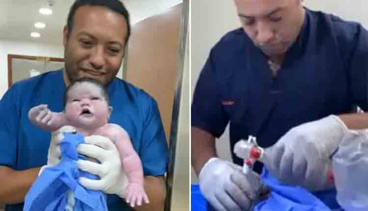 doctor save new born baby 0