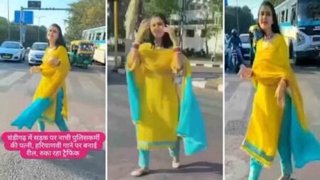 Reels - Woman making a reel in the middle of the road in Chandigarh, causing traffic congestion