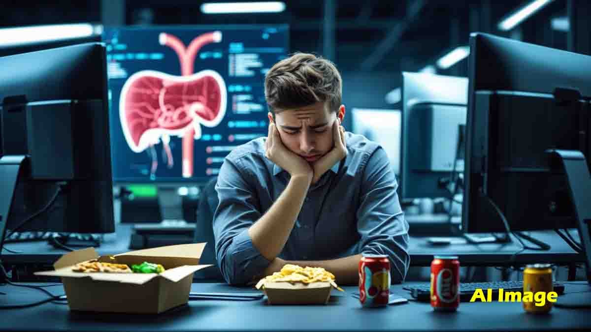Liver Disease - Young IT professional sitting at a desk for long hours, showing signs of fatigue due to fatty liver risk