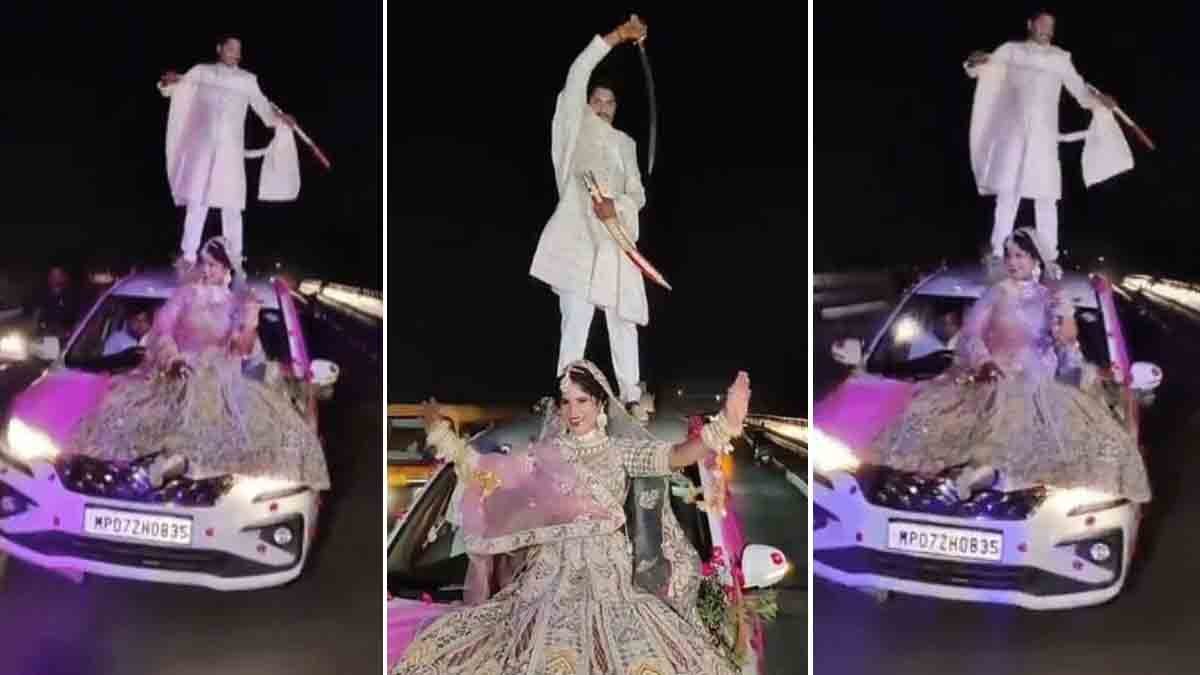 Bride and groom performing a dangerous stunt on a moving car in Gwalior