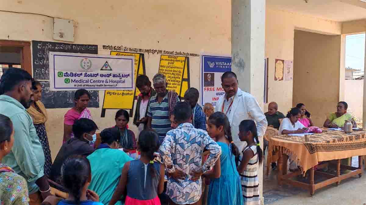 Health professionals conducting free medical check-ups at Gudibande health camp