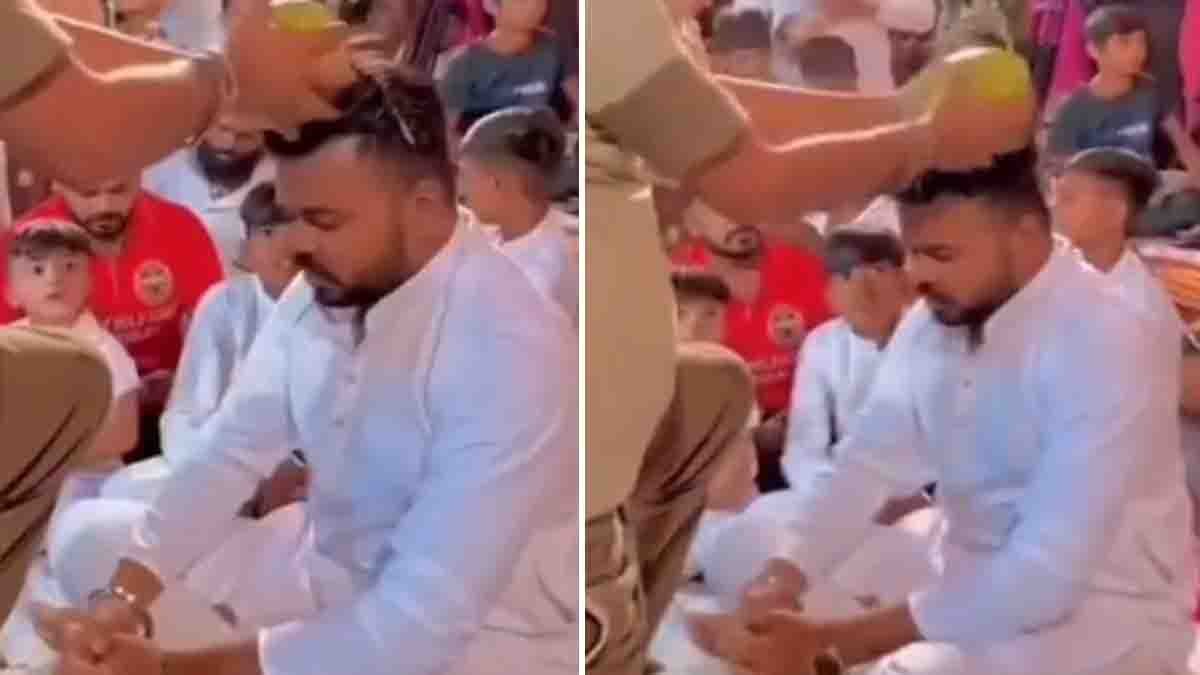 Viral Video - Man smashing coconut on groom’s head during traditional wedding ritual