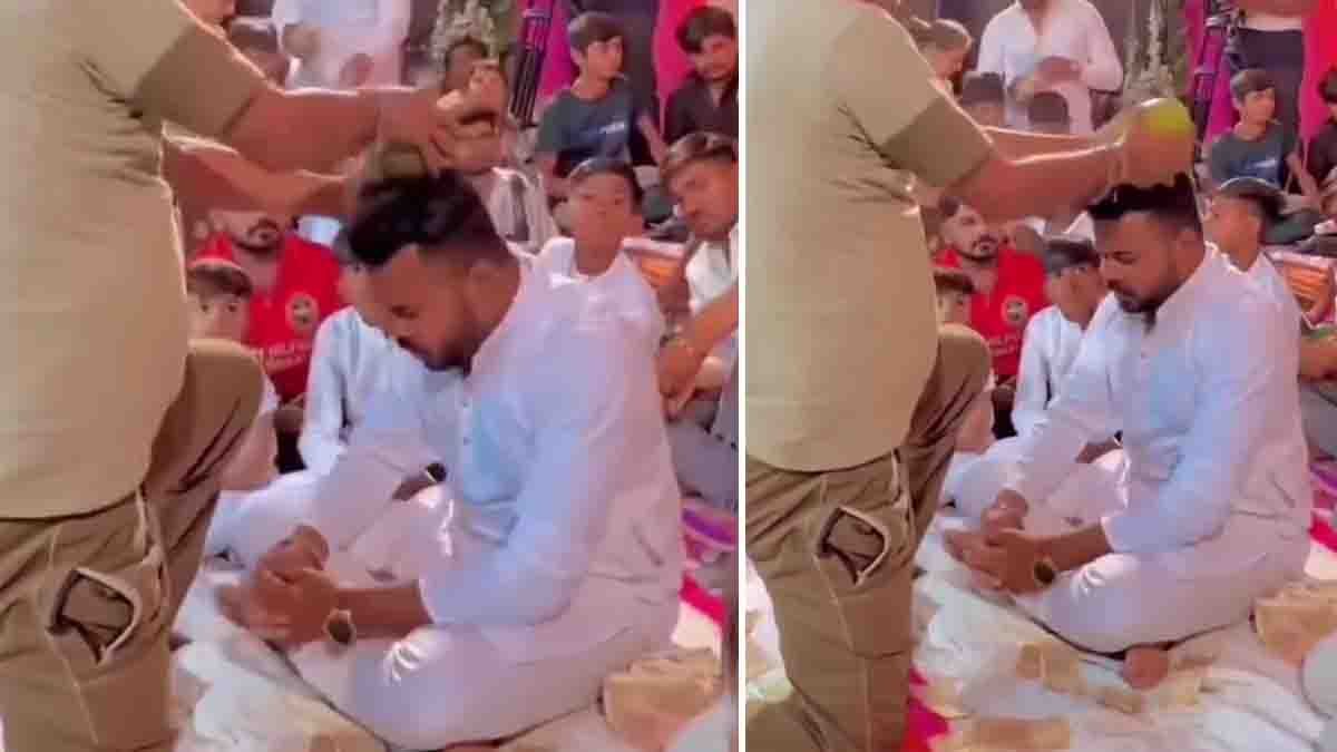 Viral Video - Man smashing coconut on groom’s head during traditional wedding ritual