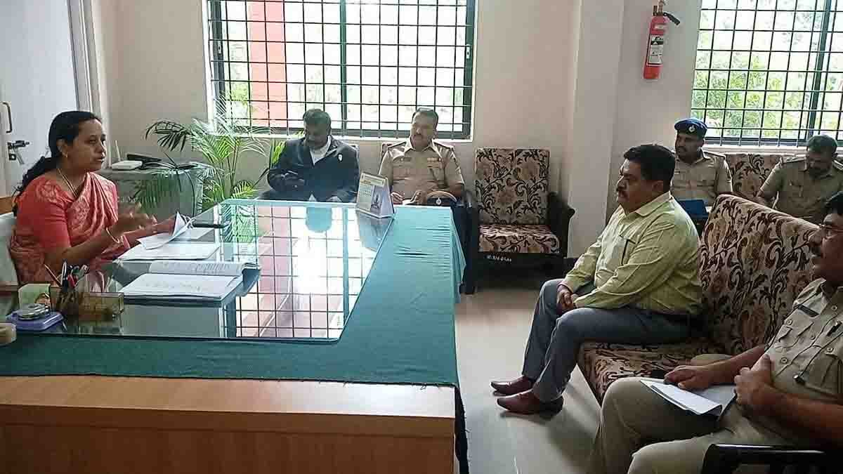 Officials discussing National Lok Adalat July 12 at Gudibande JMFC Court, Chikkaballapur
