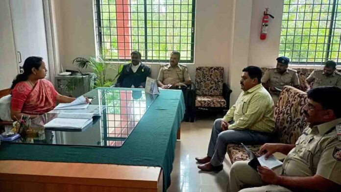 Officials discussing National Lok Adalat July 12 at Gudibande JMFC Court, Chikkaballapur