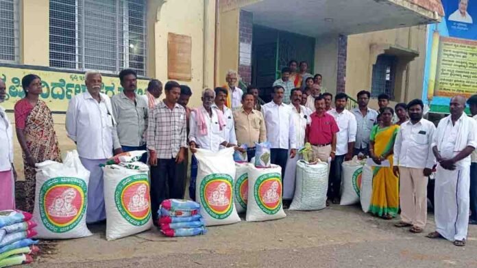 Farmers receiving quality seeds from the agriculture department during monsoon sowing season