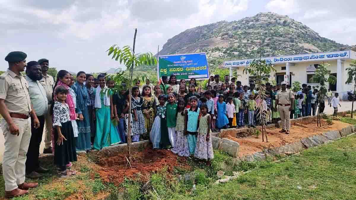 World Environment Day celebration at New Public School, Gudibande – students and teachers planting saplings with Forest Department officers to promote environmental awareness