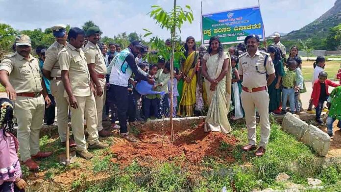 World Environment Day celebration at New Public School, Gudibande – students and teachers planting saplings with Forest Department officers to promote environmental awareness