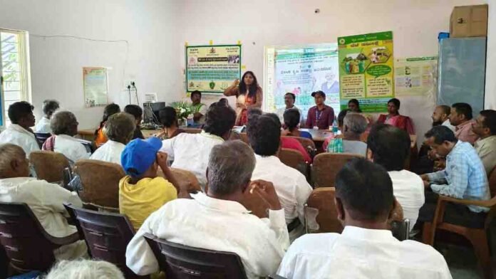 Farmers at Vikasita Krishi Sankalpa program in Gudibande, listening to agricultural guidance