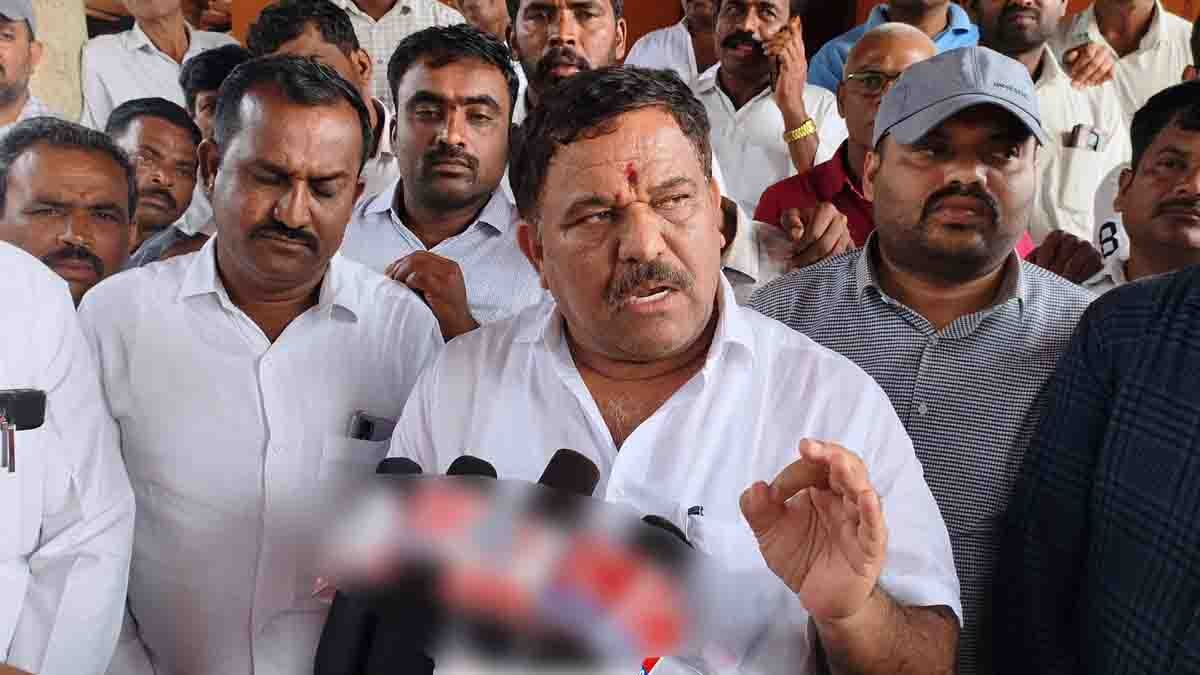 MLA S.N. Subbareddy performs Bhoomi Pooja with villagers present for ₹20 lakh canal construction project in Nuligumba village, Gudibande taluk, Karnataka - Local News
