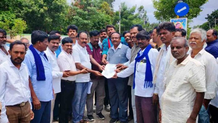 Symbolic protest in Gudibande with students and local residents holding placards, demanding proper KSRTC bus services and a new bus depot establishment