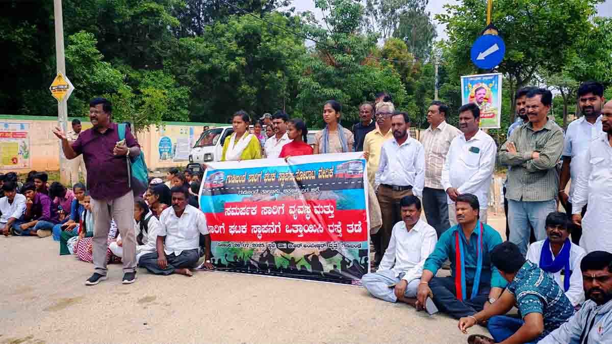 Symbolic protest in Gudibande with students and local residents holding placards, demanding proper KSRTC bus services and a new bus depot establishment