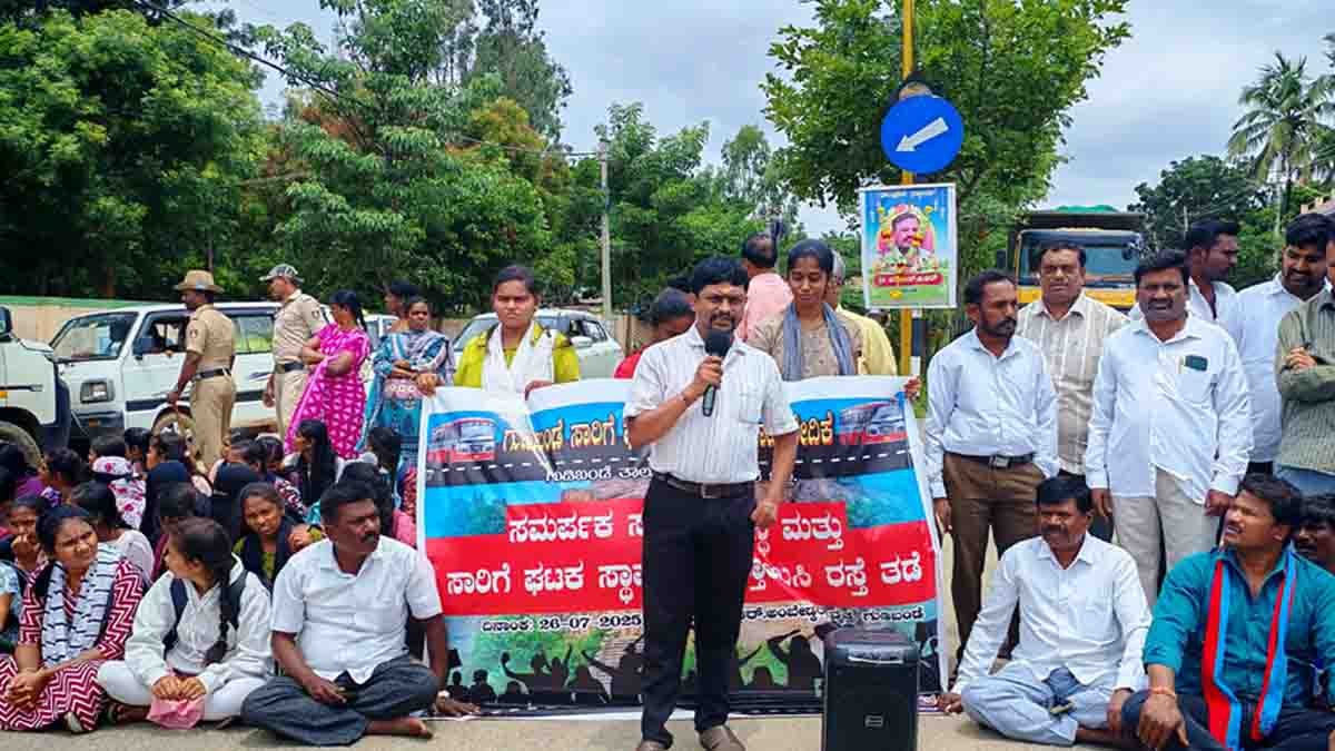 Symbolic protest in Gudibande with students and local residents holding placards, demanding proper KSRTC bus services and a new bus depot establishment