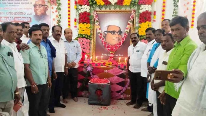 Officials and local leaders paying floral tributes to the portrait of Dr. Babu Jagjivan Ram during his 39th death anniversary event at Gudibande - Local News