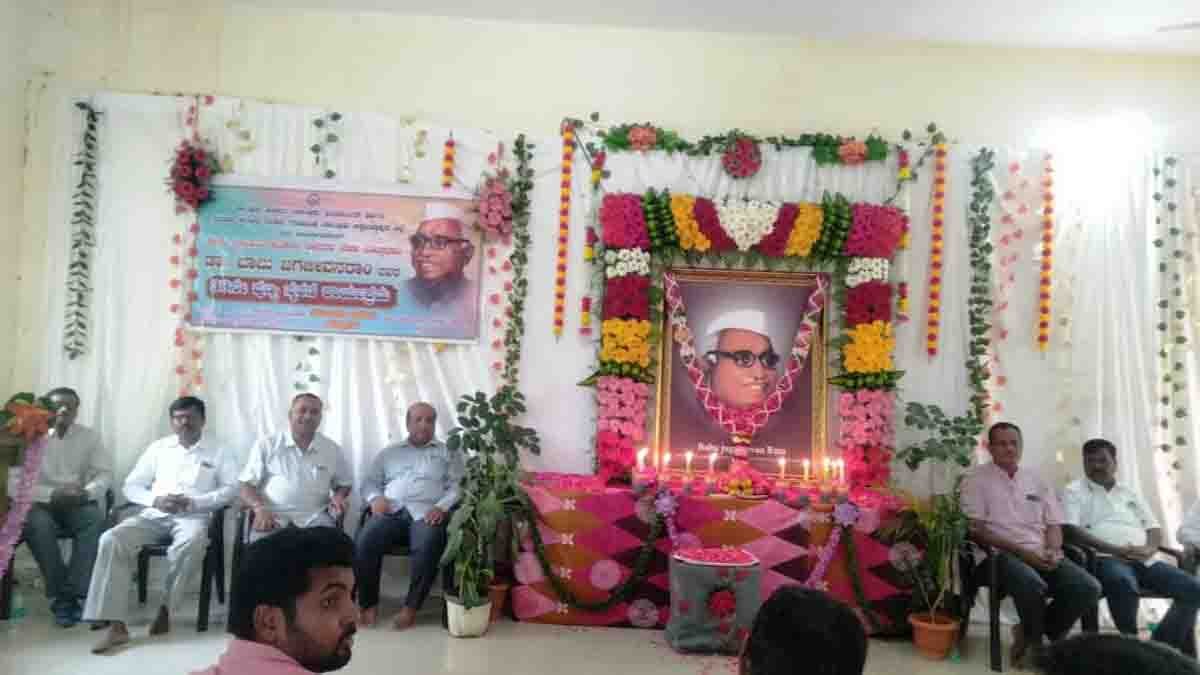 Officials and local leaders paying floral tributes to the portrait of Dr. Babu Jagjivan Ram during his 39th death anniversary event at Gudibande - Local News