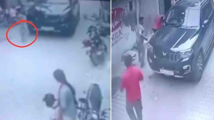 Toddler survives after being dragged under SUV in Punjab street accident - Viral Video