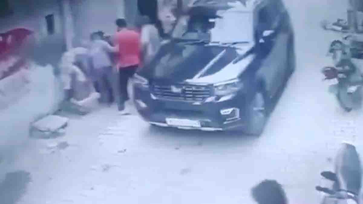 Toddler survives after being dragged under SUV in Punjab street accident - Viral Video