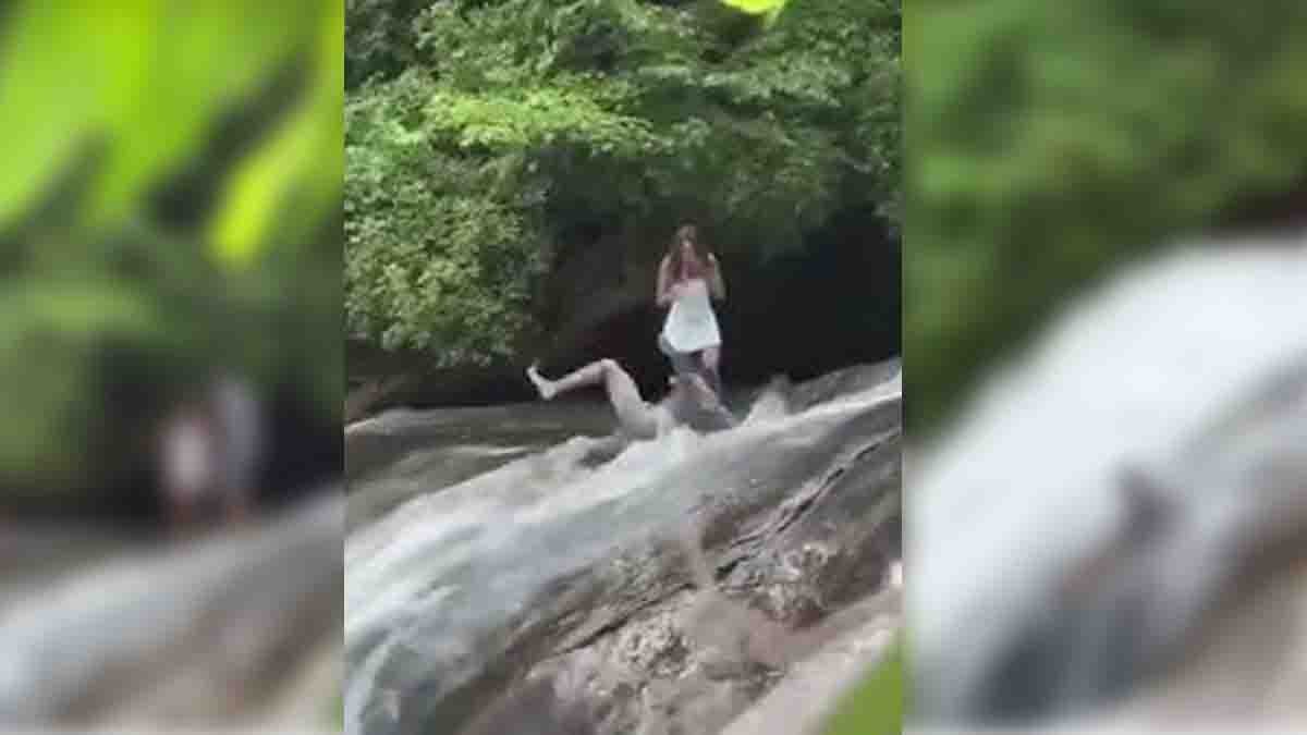 Man slipping while proposing near a waterfall, viral love proposal gone wrong