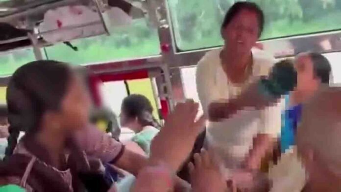 Woman hitting man with slipper during bus seat fight in Andhra Pradesh - Video