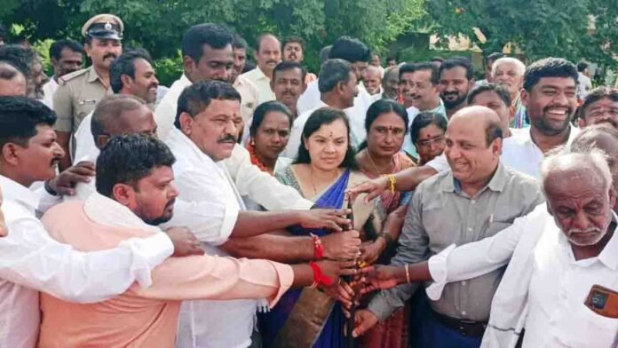 MLA S.N. Subbareddy performing Bhoomi Pooja for new Gram Panchayat building in Thirumani village, surrounded by villagers and officials during a development program in Gudibande, Karnataka- Local News