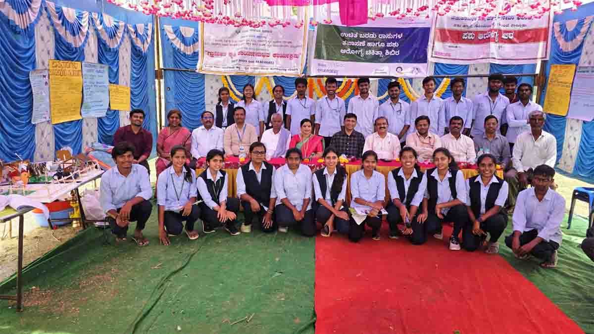 Farmers with cattle receiving free veterinary treatment during dairy farming awareness camp in Chikkaballapur