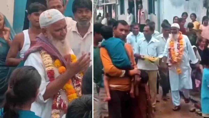 Retired teacher Noor Khan being honored by villagers with garlands and a procession during his farewell ceremony in Madhya Pradesh, emotional viral moment - Viral Video