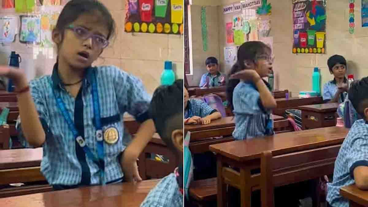 A little girl dancing joyfully in a classroom to the viral Jutti Meri song, showing pure innocence and confidence - Video