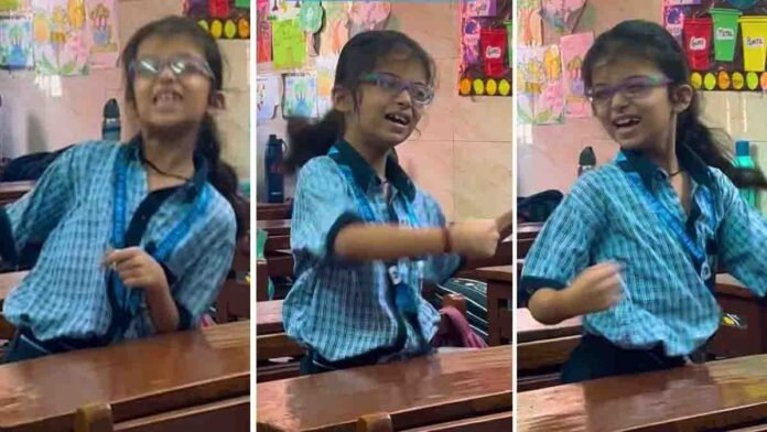 A little girl dancing joyfully in a classroom to the viral Jutti Meri song, showing pure innocence and confidence - Video