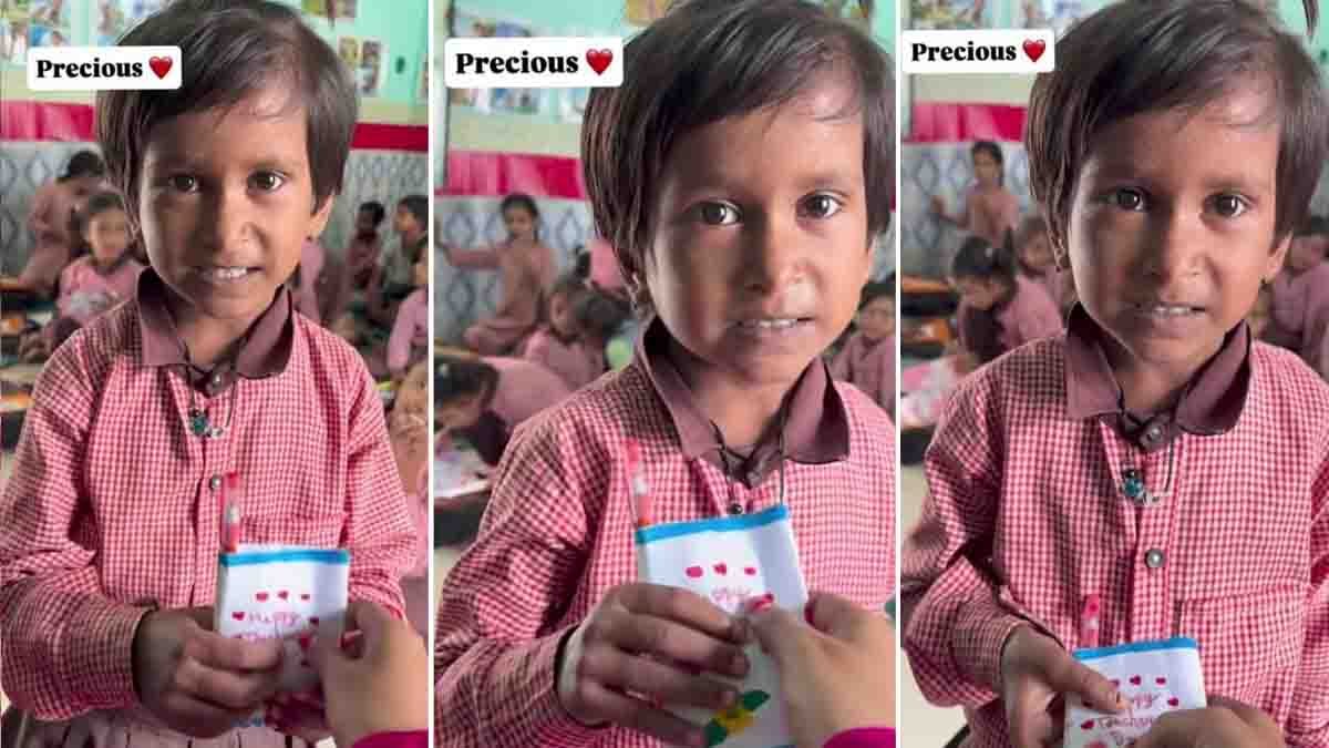 A schoolgirl gives her teacher a simple yet heartwarming gift of a pen and Hajmola candy wrapped in paper, bringing a big smile to the teacher’s face inside a classroom - Video