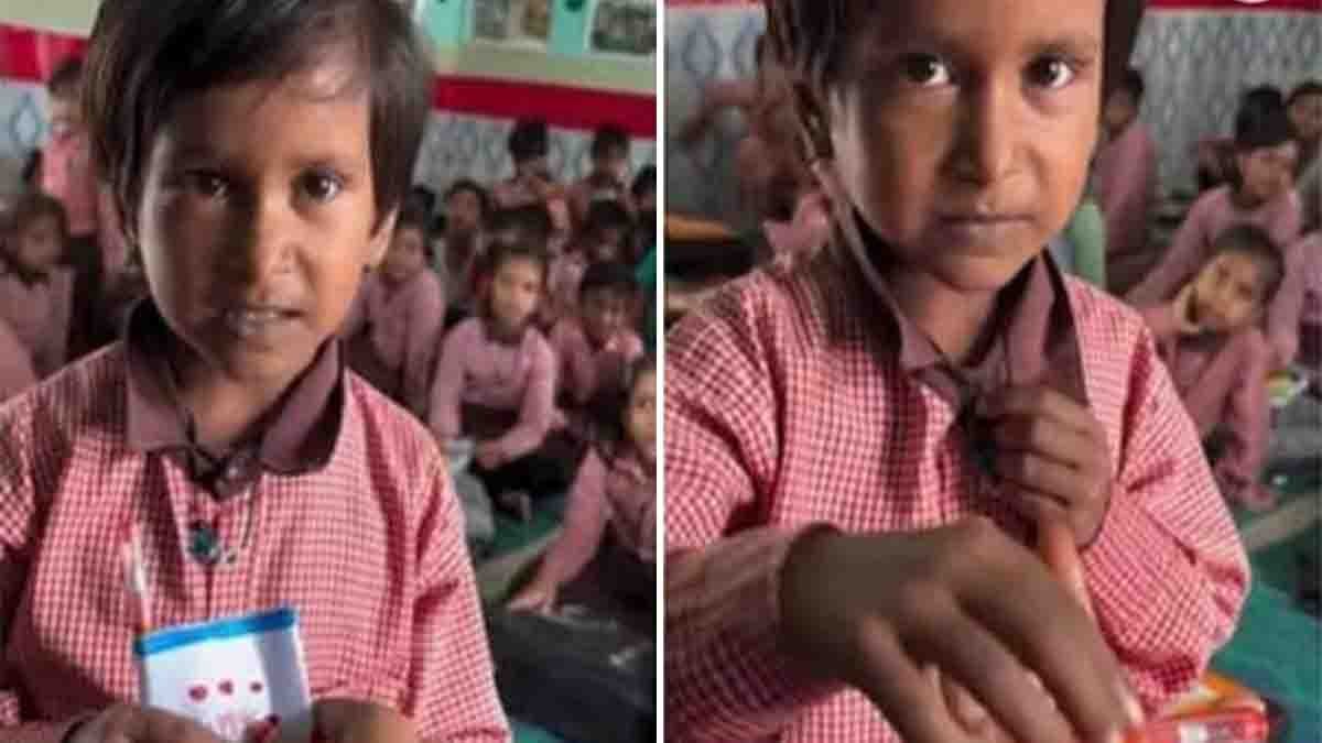A schoolgirl gives her teacher a simple yet heartwarming gift of a pen and Hajmola candy wrapped in paper, bringing a big smile to the teacher’s face inside a classroom - Video