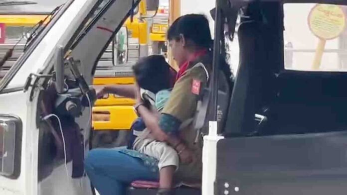 Inspiring viral video of a mother driving an auto with her little child on her lap, symbolizing sacrifice, courage, and unconditional love