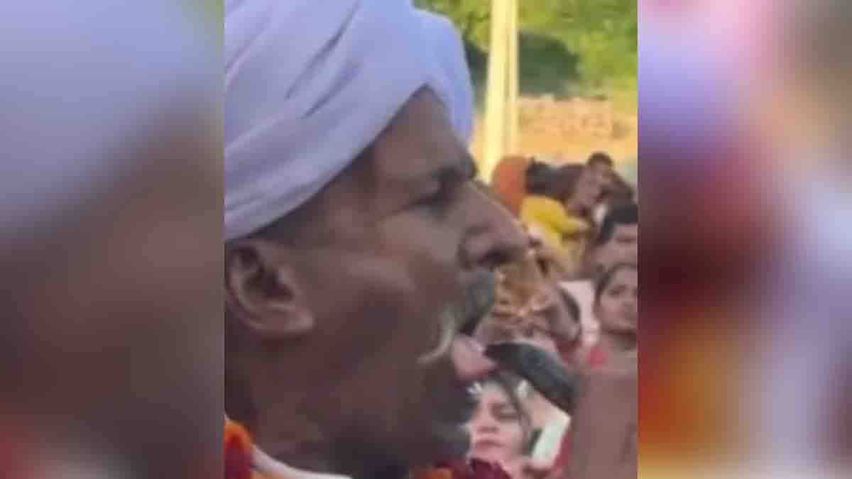 Tejaji Maharaj procession in Rajasthan viral video, man drinks milk with snake, snake bite on tongue, religious ritual and faith vs science debate