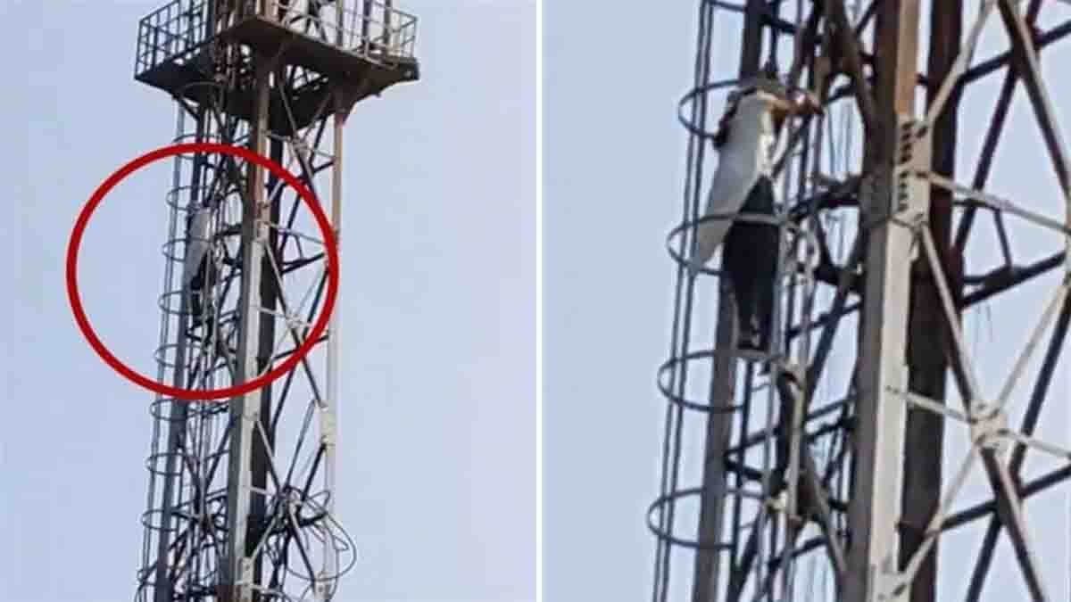 Indian teenage girl sitting on top of a mobile tower in Mirzapur after argument with her mother over Diwali cleaning, police and locals gathered below — viral video news scene