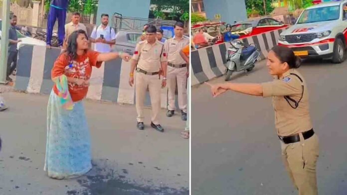 bhopal-viral-video-woman-argues-with-female-cop 0 A woman causing chaos in the middle of a busy road outside Rani Kamlapati Railway Station in Bhopal, arguing with a female police officer while traffic and onlookers gather — Bhopal viral video scene