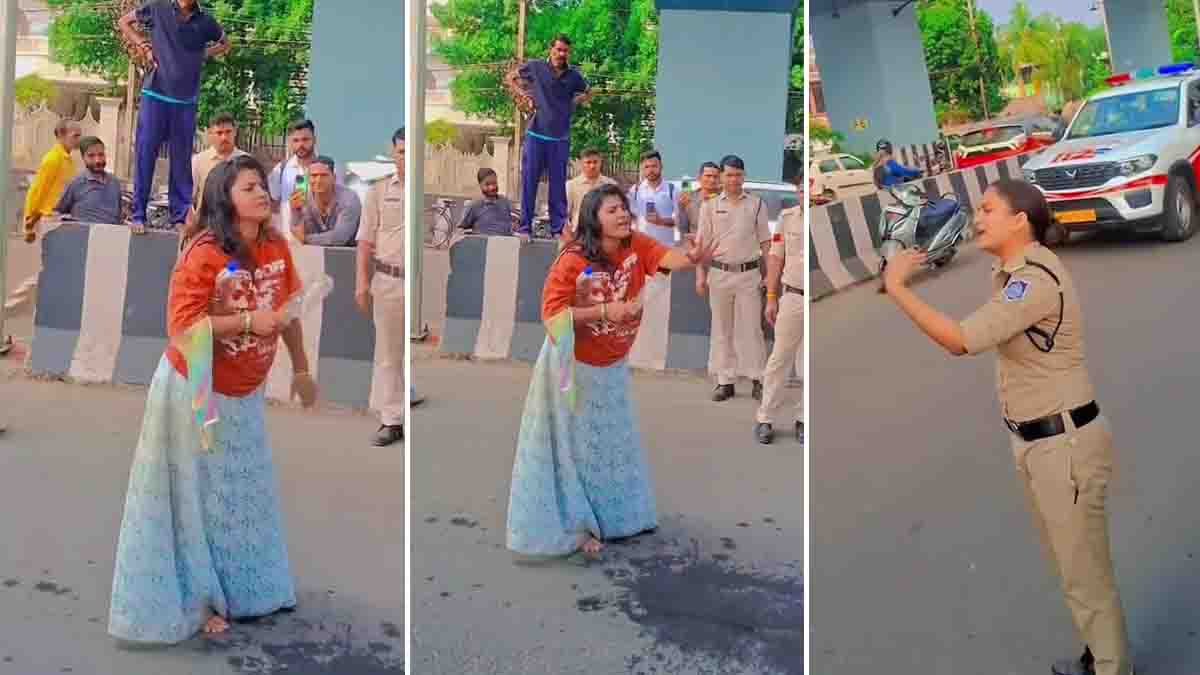 Bhopal Viral Video : ರಸ್ತೆಯ ಮಧ್ಯೆ ನಿಂತು ಹೈಡ್ರಾಮಾ; ಪೊಲೀಸ್ ಅಧಿಕಾರಿಗೂ ಬಿಡದ ಮಹಿಳೆ, ವೈರಲ್ ಆದ ವಿಡಿಯೋ..! 1 A woman causing chaos in the middle of a busy road outside Rani Kamlapati Railway Station in Bhopal, arguing with a female police officer while traffic and onlookers gather — Bhopal viral video scene