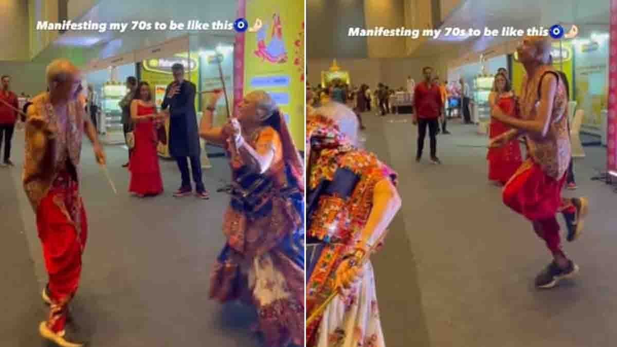 Elderly couple performing energetic Dandiya dance in colorful traditional Garba outfits during Navaratri 2025 celebration