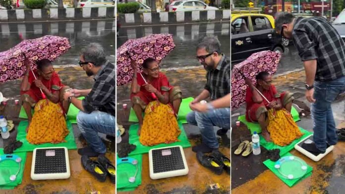 Elderly woman sitting roadside in heavy rain with weighing machines, young man helps her with money, saree gift and tea – viral heartwarming video