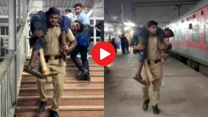 UP Police officer lends his shoulder to help a differently-abled man board a train — a viral act of true humanity - Video
