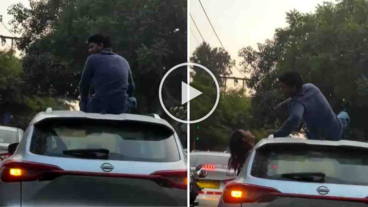 Couple performing dangerous romantic stunt on moving car roof in Delhi, police action viral video scene