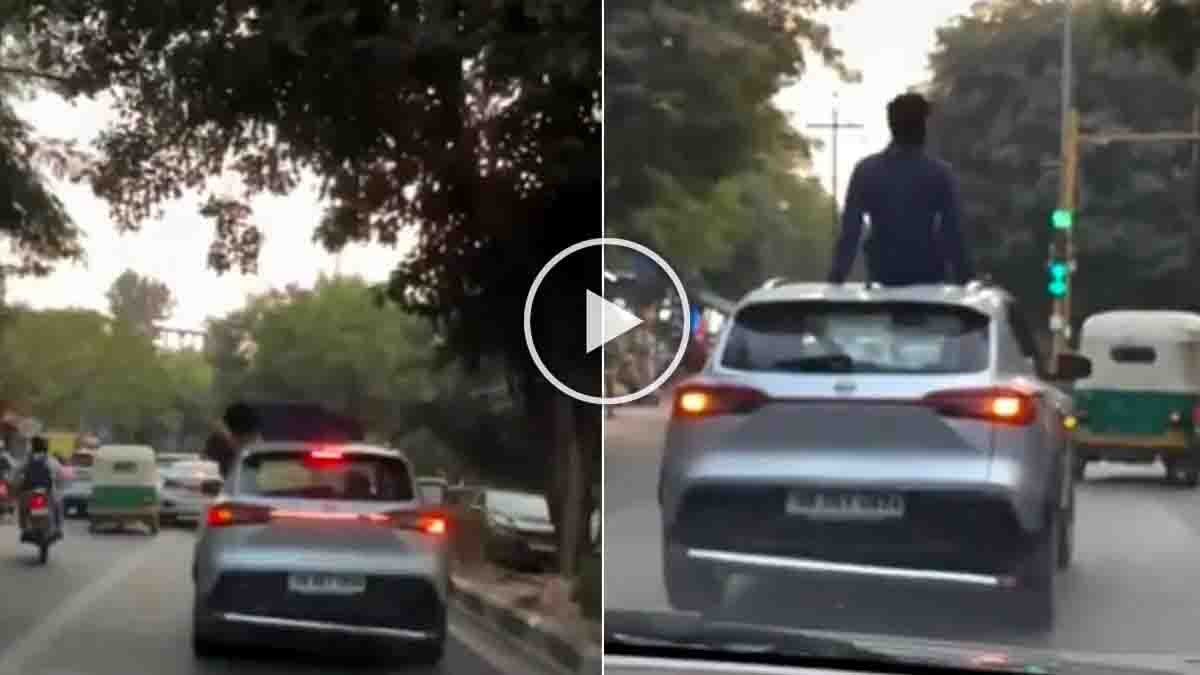 Couple performing dangerous romantic stunt on moving car roof in Delhi, police action viral video scene
