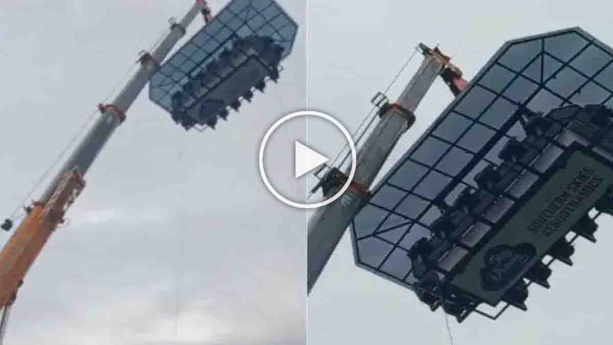Tourists stranded on a sky dining platform 120 feet above ground after a crane malfunction in Kerala, with rescue operations underway - Viral video