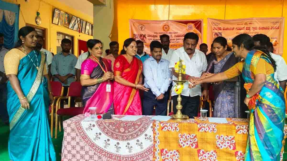 MLA S.N. Subbareddy speaking to students during a Children’s Day program in Gudibande, highlighting the importance of intellectual sports like chess and carrom for improving concentration, brain power, and overall student development. - Local News