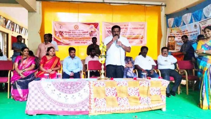 MLA S.N. Subbareddy speaking to students during a Children’s Day program in Gudibande, highlighting the importance of intellectual sports like chess and carrom for improving concentration, brain power, and overall student development. - Local News