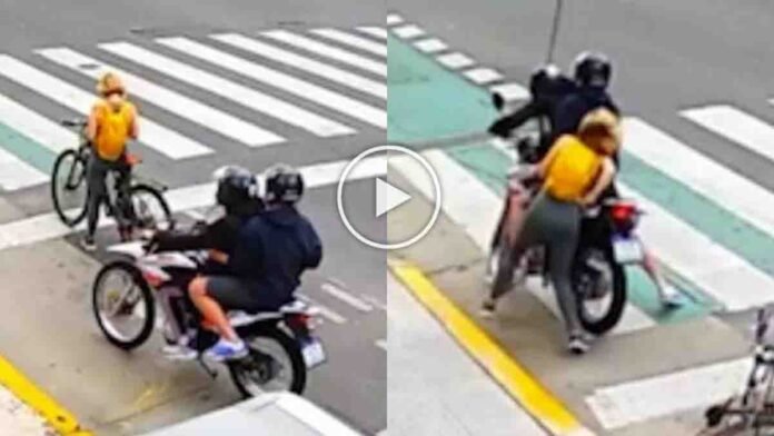 Russian woman Alexandra Doketova bravely catching bike thief in Buenos Aires traffic signal, viral CCTV moment, real crime incident in Argentina
