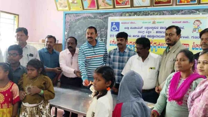 Teachers and officials assisting specially-abled children during a medical check-up camp in Gudibande, Karnataka - Local News