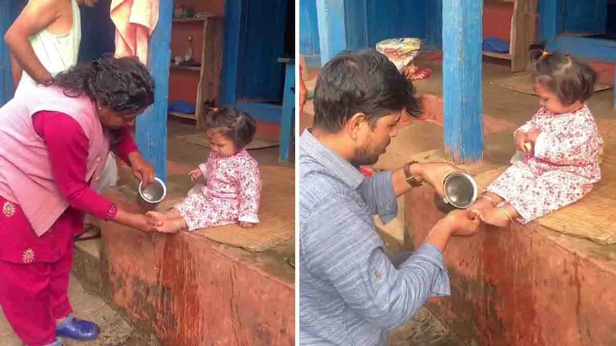 Video : ಸನಾತನ ಧರ್ಮದ ಸೌಂದರ್ಯ: ಮನೆಯ ಪುಟ್ಟ ಲಕ್ಷ್ಮಿಯ ಪಾದಪೂಜೆ – ವೈರಲ್ ವಿಡಿಯೋ ನೋಡಿ..! 2 An Indian family performing Padapuja for their little daughter, treating her as Goddess Lakshmi — a heartwarming moment reflecting Sanatana Dharma traditions and respect for women - Viral Video