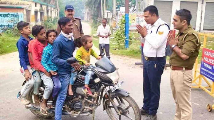 Hapur man caught riding bike with six children, viral road safety