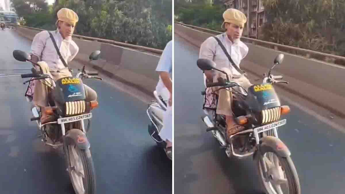 Physically challenged man without hands rides a bullet bike at high speed on the road, showing courage and confidence